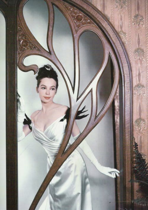 Leslie Caron in an Oscar winning costume designed by Cecil Beaton for &#8216;Gigi&#8217;, 1958.