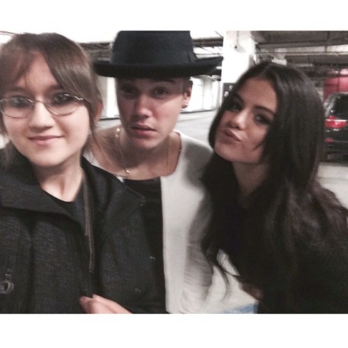 June 20: Justin and Selena with a fan tonight