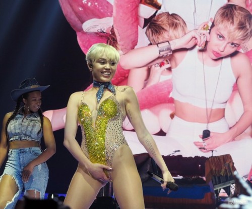 Well now, Miss “I need attention because I’m a whore” is now sucking fake dicks on stage at her concerts. I just hope no kids are going to these concerts. Personally I still think she&#8217;s funny looking as fuck, but she like to show skin and most importantly she sure looks like she knows her way around a cock&#8230;#1