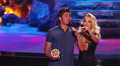BRB watching this GIF of Rita Ora ripping Zac Efron&#8217;s shirt off over &amp; over again.