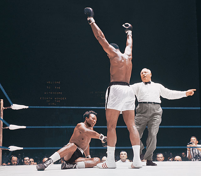 Muhammad Ali stands over Cleveland Williams after knocking him down in the third round of their 1966 fight. Williams was knocked down four times in the fight, with the referee stopping the action in the third round as Ali dominated from start to finish. &nbsp;(Neil Leifer/SI)&#10;SI VAULT: Ali massacres Williams, wins fight in third round (11.21.66)
