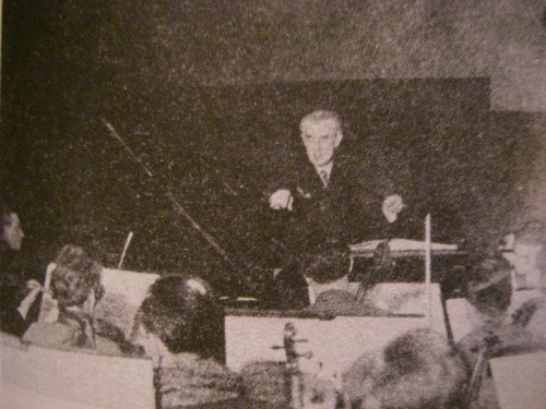 Ravel on the podium, conducting a rehearsal of his Piano Concerto for the Left Hand, 1933.