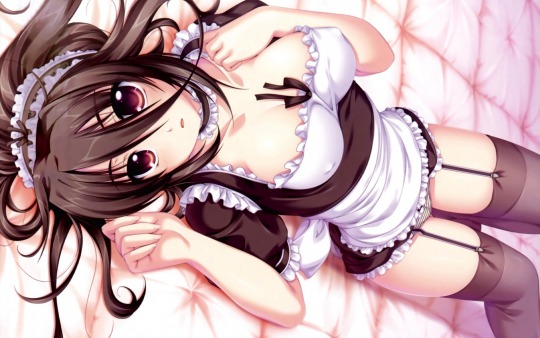 Maid relaxing on bed