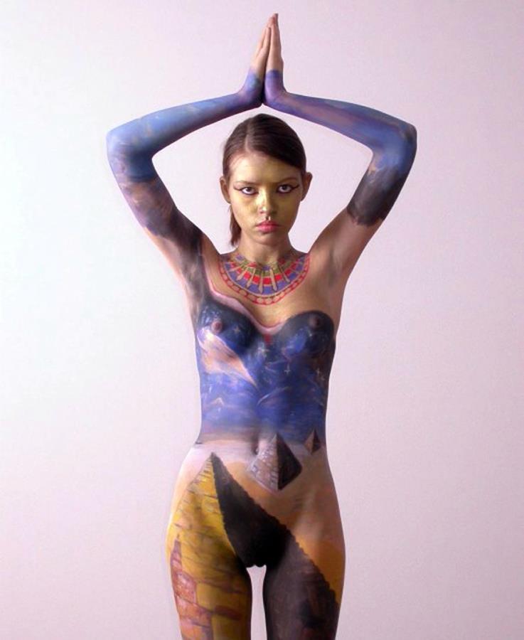 Nudist girl beach body paint