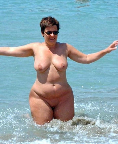 Mature woman bikini beach