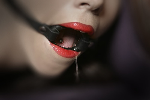 Gagged and drooling