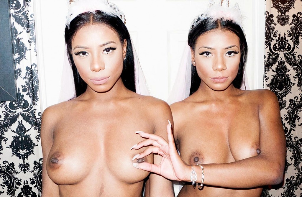 Topless twin girls