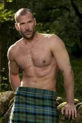 Men in kilts with tattoos