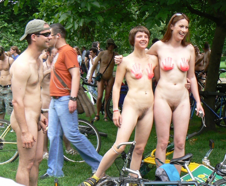 Tattooed woman naked world bike ride