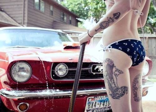 Sexy babe washing car