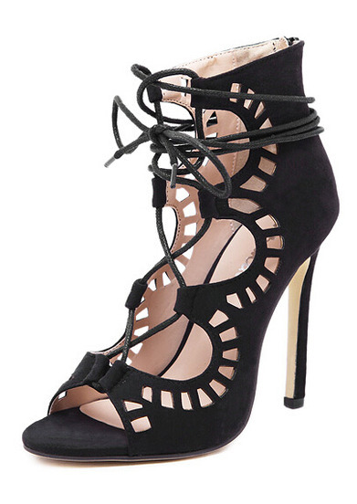 Feet in heels sexy strappy sandals