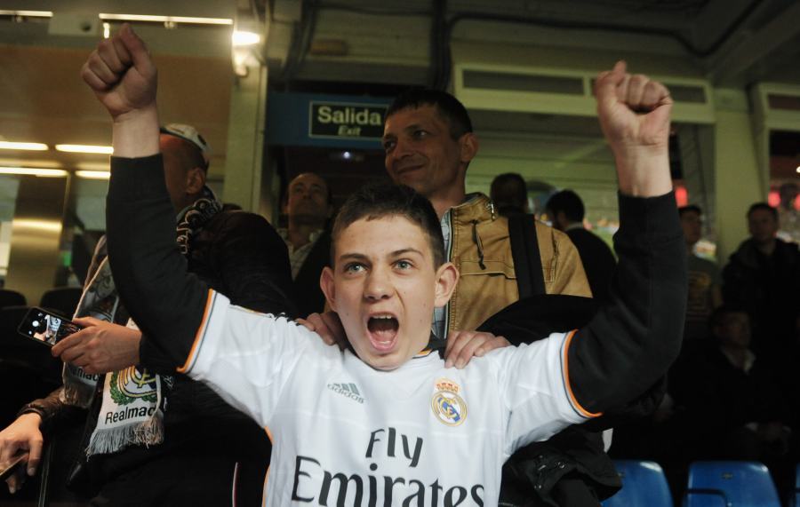  sir-nando: That boy up there is Dawid Pawlaczyk, a 14 year-old from Poland. Last year, on August 14, while biking back from his friend’s house he was hit by a car which caused him to go into a coma for 3 months. He has been a fan of Real Madrid for 3 years now. His parents, never losing faith, brought to the hospital his favorite Real bed covers and played Real’s games through earphones, as he still ceased to wake up. A miracle happened on November 18th. After the emotions of Cristiano Ronaldo scoring, Dawid opened his eyes for the first time since the accident. He was back home a month later. A Polish newspaper, Fakt, contacted Cristiano about this amazing story and he reacted immediately. His agent Jorge Mendes contacted the Pawlaczyk family and invited them to Madrid at his own cost. Because of this, Dawid was able to watch Real play Dortmund this Wednesday as a VIP. After the game, Cristiano met with him personally. He was sure to ask Dawid about his state of health and how proud he was with the boy’s strength. Cristiano was so inspired by Dawid’s story, he was sure to invite him back for the semi-finals of the Champions League. And even with all that, Cristiano gave the young boy his match game shirt, to which Dawid responded would “be put in a frame and hung on the wall”. As a sign of thanks, Dawid gave Cristiano a red and white Polish scarf, which Hugo, Cristiano’s brother who was also there, put on immediately. The point of this is: a lot of people are very critical about Ronaldo. He has a pretty face, is confident, and sometimes can come off as arrogant: but none of us have the right to judge him. He has a life beyond football and what we see on the pitch, and because he laughs mockingly sometimes or says something that you didn’t like, or just the pure fact that he wears a lot of hair gel, does not identify who he really is. This is not the first time he’s gone out of his way to do something for a fan. He answers all his fan mail, sends signed pictures and shirts to those who ask, visits hospitals, donates money and donates blood. This man, for God’s sake, doesn’t even have tattoos because then he would no longer be able to donate his blood. He doesn’t drink. Because he likes to look nice, is a good looking guy and has confidence and a strong character always seems to me, as the only thing people look at. And I’m sorry, but if this doesn’t move you in some way then there’s something wrong. Cristiano Ronaldo, from what we have seen, is an amazing, caring and thoughtful person, and personally I think it is an honor to be able to live and experience a huge celebrity who doesn’t take his fame for advantage. Yeah, he has his bad moments, but that’s because he’s human. Cristiano Ronaldo is to me, an inspiration through and through. In a world where so many celebrities neglect their fans and give off bad examples, he stands out. I’m not going anti-Messi here, nor anti-Barcelona, I’m saying this as a girl who has seen enough issues and pain around the world. I do not care if you are a Ronaldo hater or whatever. I don’t care if you call me a Ronaldo loving fangirl, I do not care if you say the only reason I care is because he’s hot, because trust me, I have to deal with enough shits who make fun of me everyday. And yes, it has to do with gender, but that’s a different story. Whether you love him or hate him or you’re stuck between the Messi-Ronaldo fight, there is one thing you have to admit: Cristiano Ronaldo is, and I’ll say it again, an inspiration and an outstanding person. And if you ever tell me he’s an egotistical bastard stuck in his hair gel, I will shoot you down every single time. Because if you cannot see a good person in all he has done, then may God help us all. Source: (It’s in Polish)  What a beautiful story, demonstrating the power of love and never giving up. Football = ♥Much more pics here