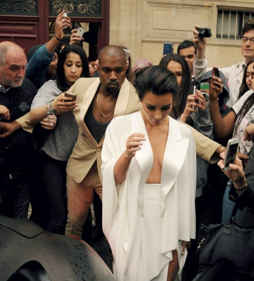 briella21: Every man needs to treat their woman, the way Kanye treats Kim, like a Queen.