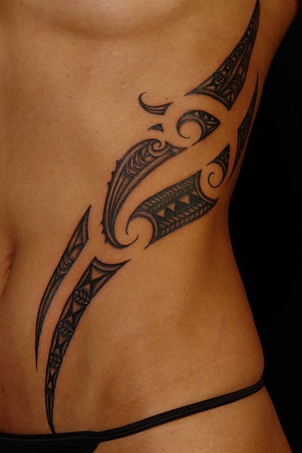 Polynesian shoulder tattoos for men