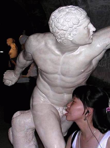 Hot chick fucks a statue