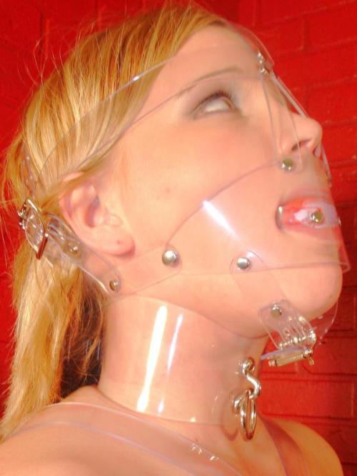 Transparent latex maid bondage