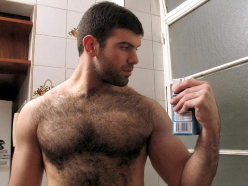 Hairy chested men in uniforms