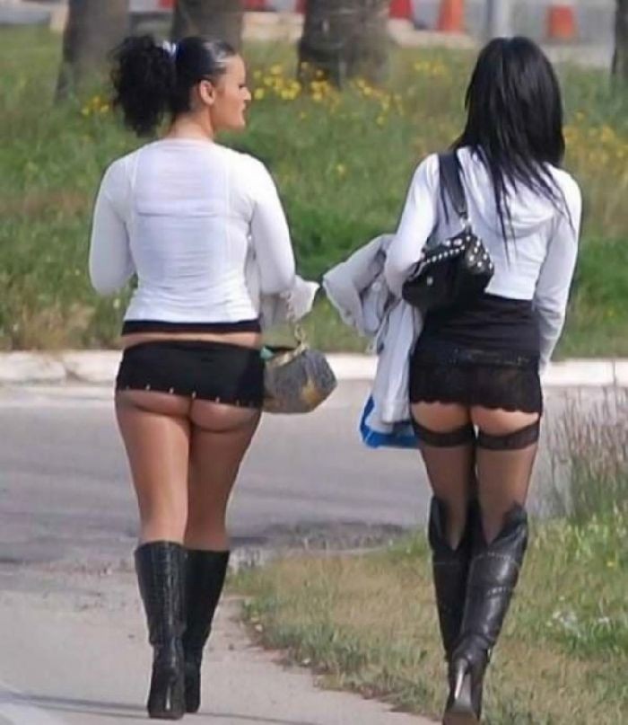 Sexy sluts in leather mini skirts