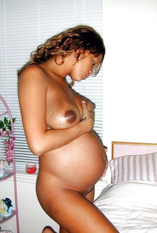 Nude pregnant black woman